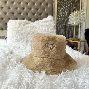 tan prada bucket hat